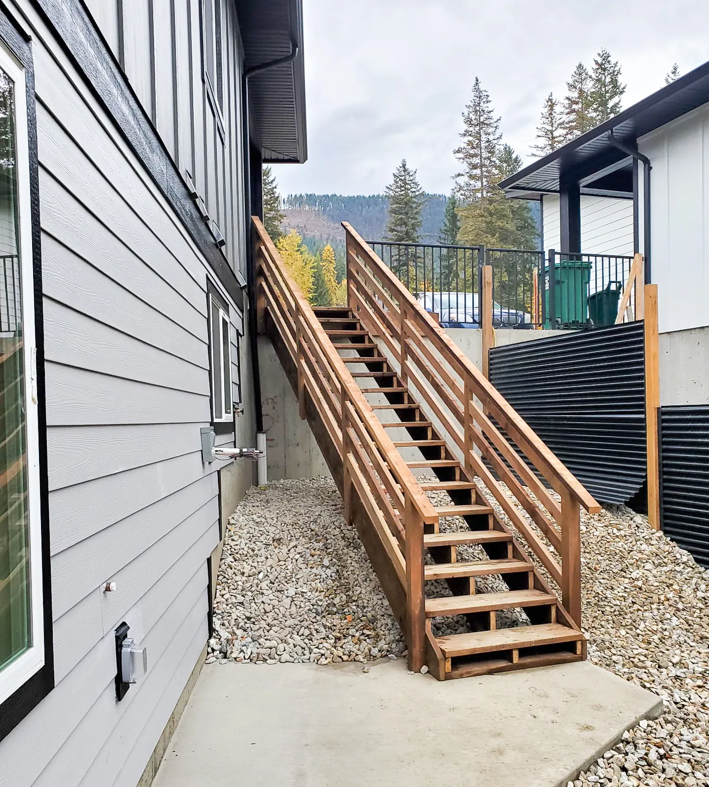 Exterior stairs and railing built onto a home